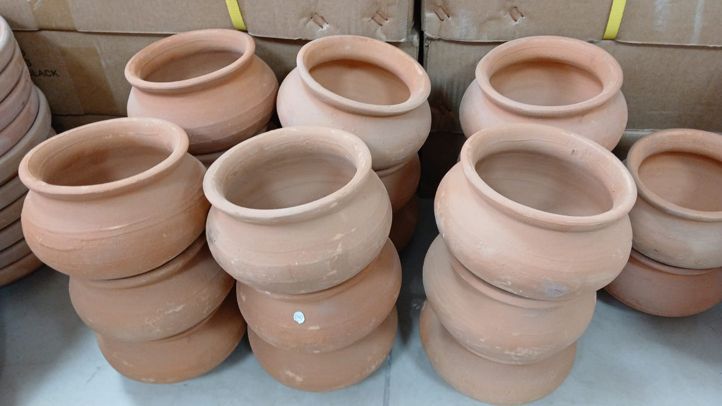 A waterer and feeder made of pottery, made for birds